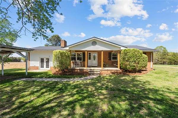 3 Acres of Land with Home for Sale in Gibsonville, North Carolina