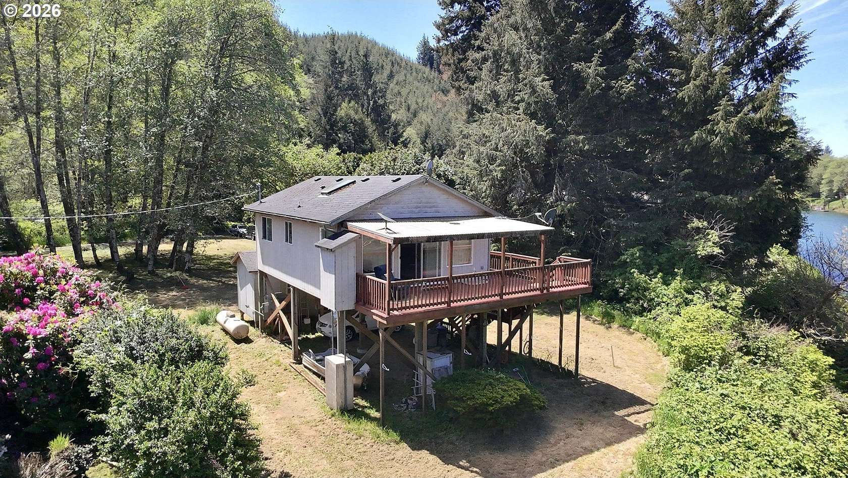 0.84 Acres of Land with Home for Sale in Siletz, Oregon
