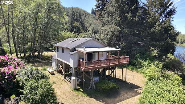 0.84 Acres of Land with Home for Sale in Siletz, Oregon