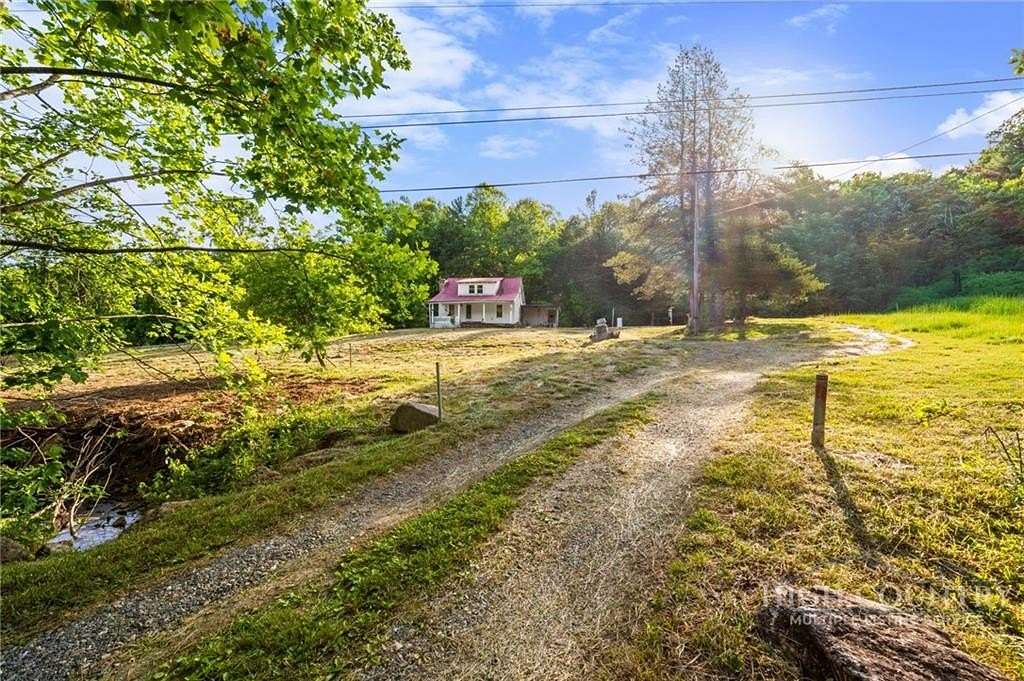 21.8 Acres of Land with Home for Sale in Deep Gap, North Carolina