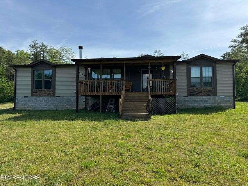 32 Acres of Agricultural Land with Home for Sale in Clarkrange, Tennessee