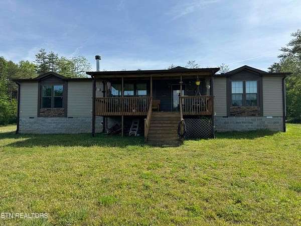 32 Acres of Agricultural Land with Home for Sale in Clarkrange, Tennessee