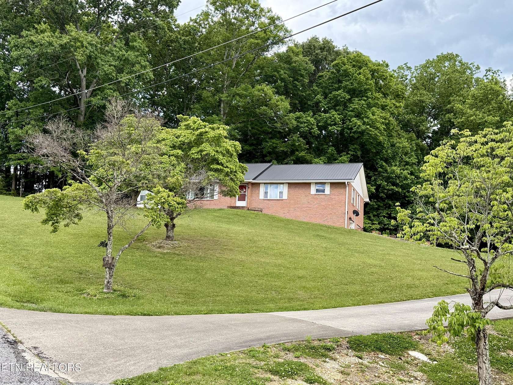2.6 Acres of Land with Home for Sale in La Follette, Tennessee