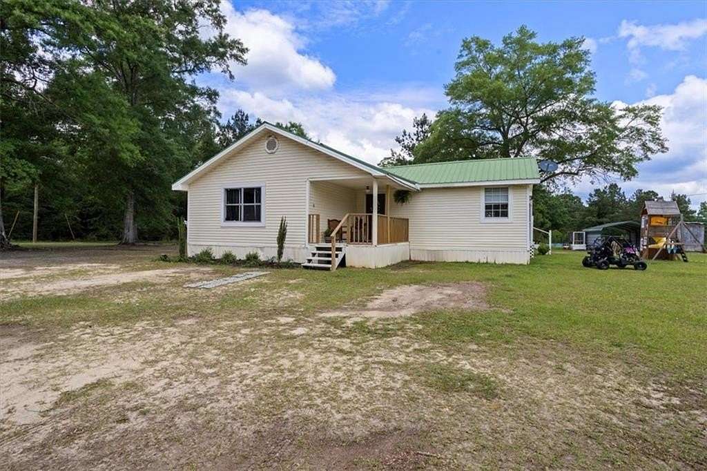 19 Acres of Land with Home for Sale in Vinegar Bend, Alabama