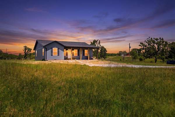 8.3 Acres of Land with Home for Sale in Mansfield, Missouri