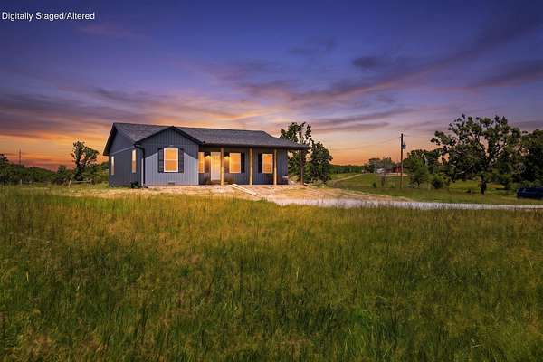 8.3 Acres of Land with Home for Sale in Mansfield, Missouri
