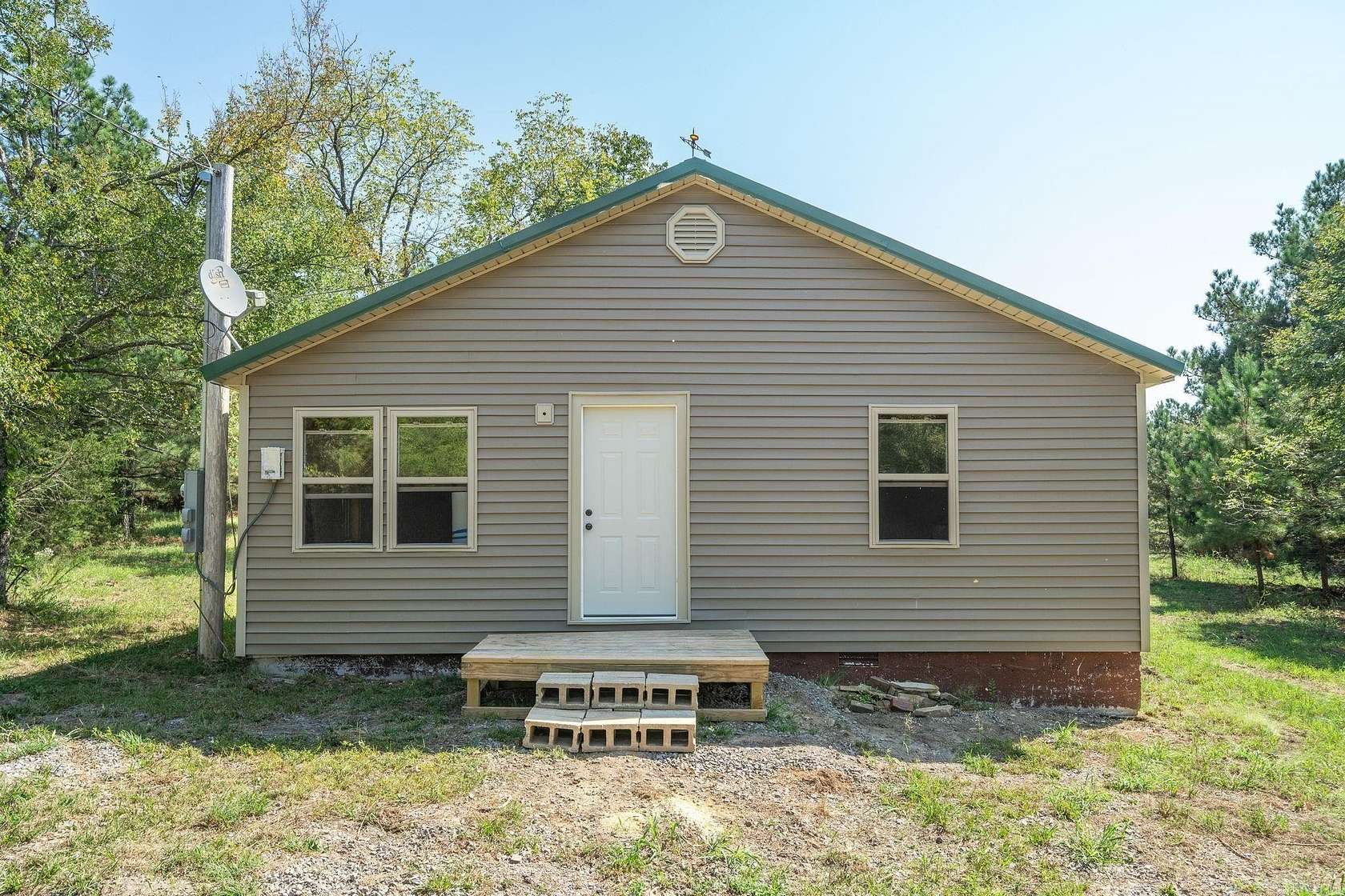 40 Acres of Recreational Land with Home for Sale in Paris, Arkansas