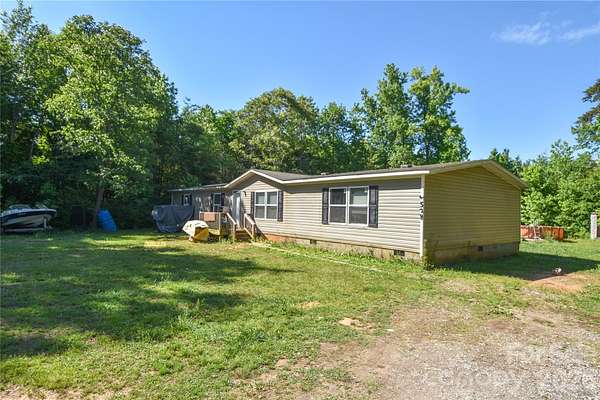 2.1 Acres of Land with Home for Sale in Denver, North Carolina