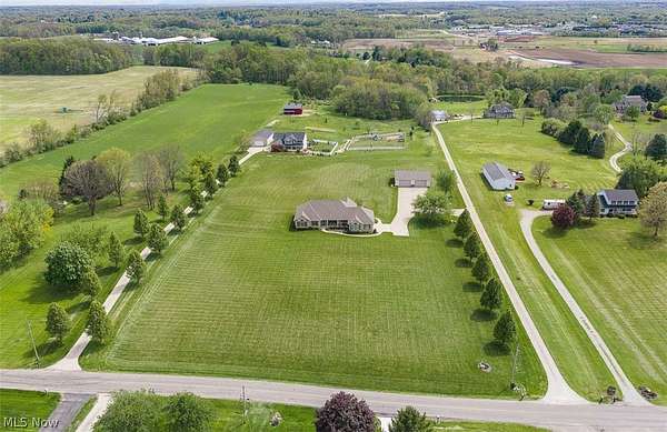 4 Acres of Land with Home for Auction in Canal Fulton, Ohio