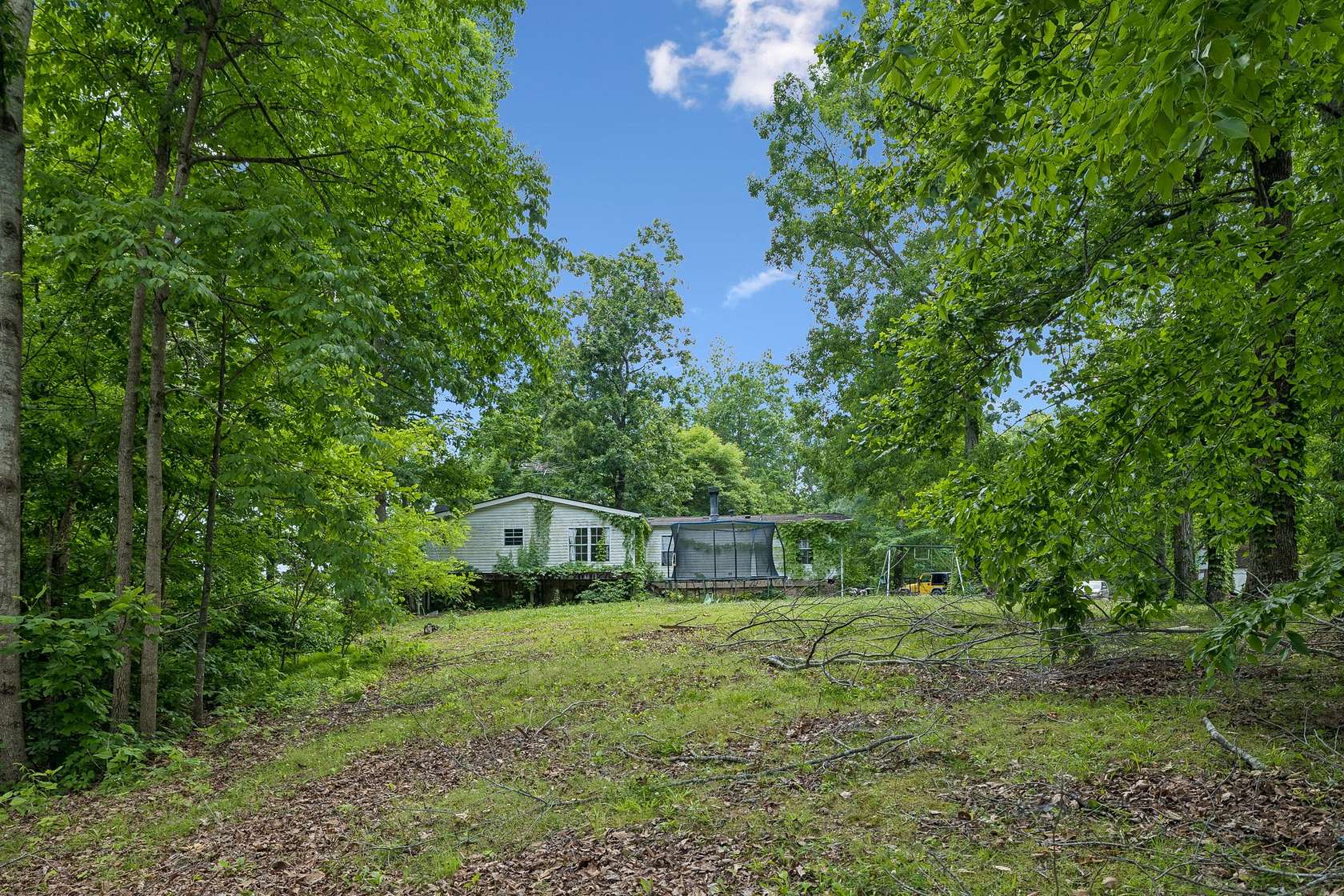 21 Acres of Recreational Land with Home for Sale in Hampshire, Tennessee