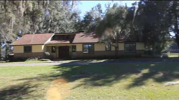 86.7 Acres of Land with Home for Sale in Reddick, Florida