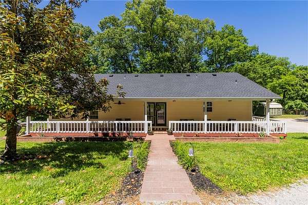 7.43 Acres of Land with Home for Sale in Rogers, Arkansas