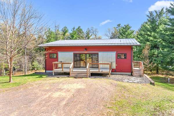3 Acres of Land with Home for Sale in Webb Lake, Wisconsin