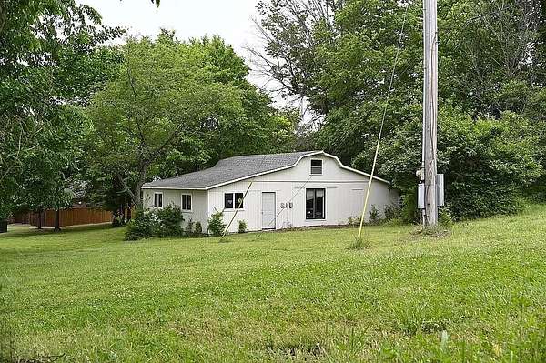 1.5 Acres of Land with Home for Sale in Fayetteville, Arkansas