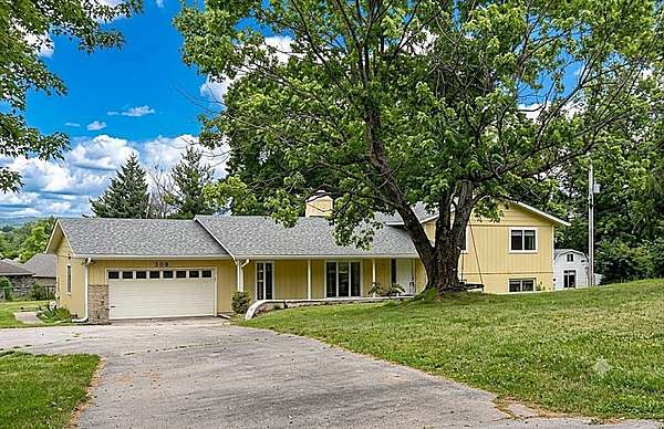 1.5 Acres of Land with Home for Sale in Fayetteville, Arkansas