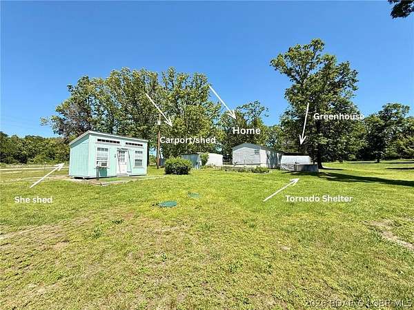 4 Acres of Land with Home for Sale in Versailles, Missouri