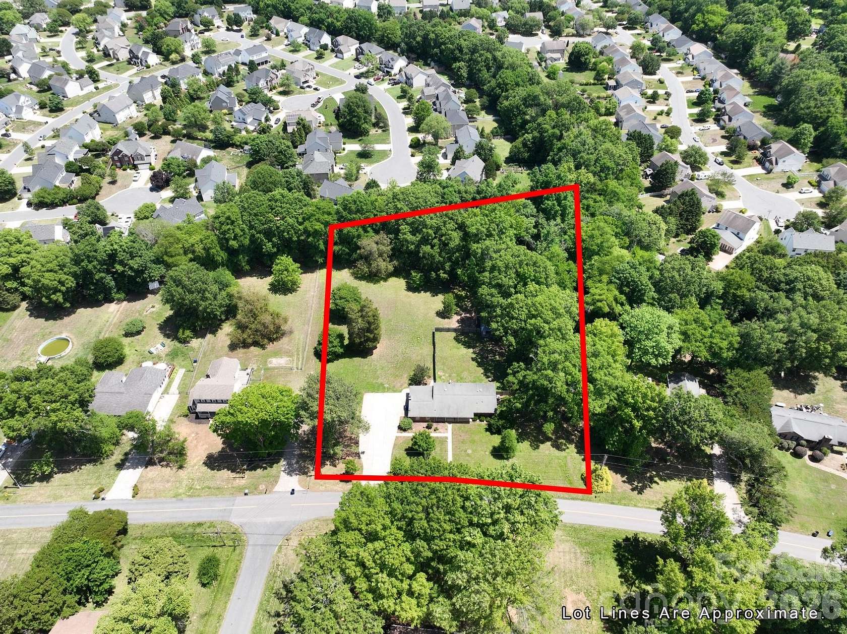 1.68 Acres of Land with Home for Sale in Harrisburg, North Carolina