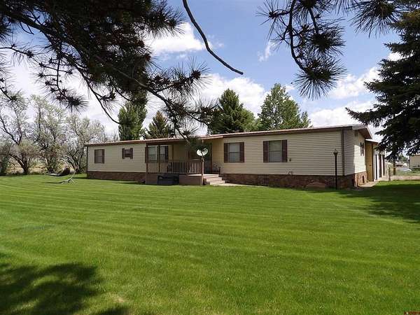 8 Acres of Land with Home for Sale in Del Norte, Colorado