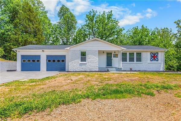 9.45 Acres of Land with Home for Sale in Ararat, North Carolina