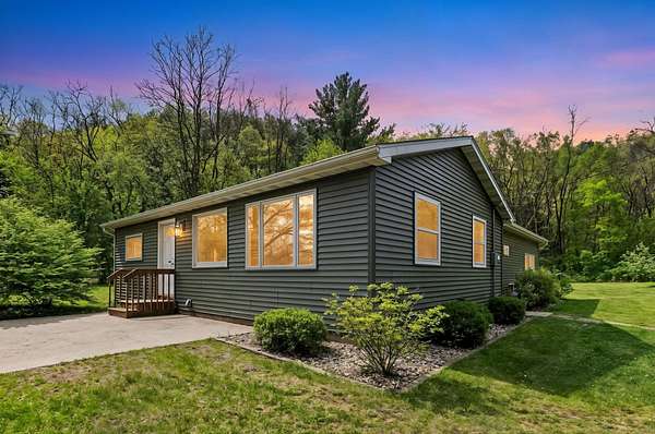 12 Acres of Recreational Land with Home for Sale in Camp Douglas, Wisconsin