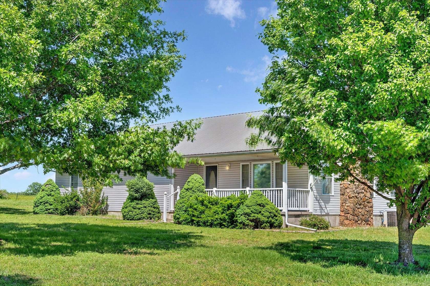 39.2 Acres of Land with Home for Sale in Everton, Missouri