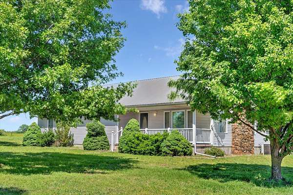 39.2 Acres of Land with Home for Sale in Everton, Missouri