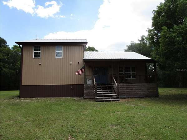 4.63 Acres of Land with Home for Sale in Dade City, Florida