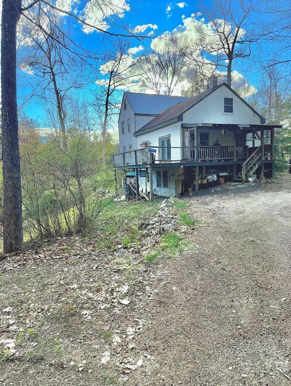 24 Acres of Recreational Land with Home for Sale in Sebago Town, Maine