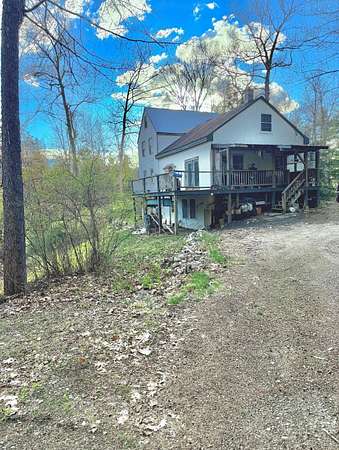 24 Acres of Recreational Land with Home for Sale in Sebago Town, Maine