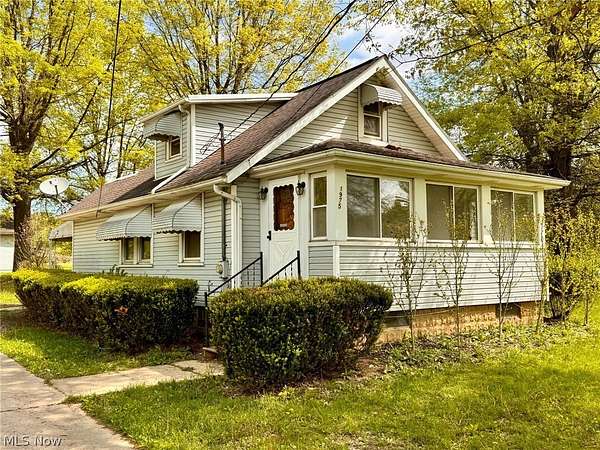 4.44 Acres of Land with Home for Auction in Norton, Ohio