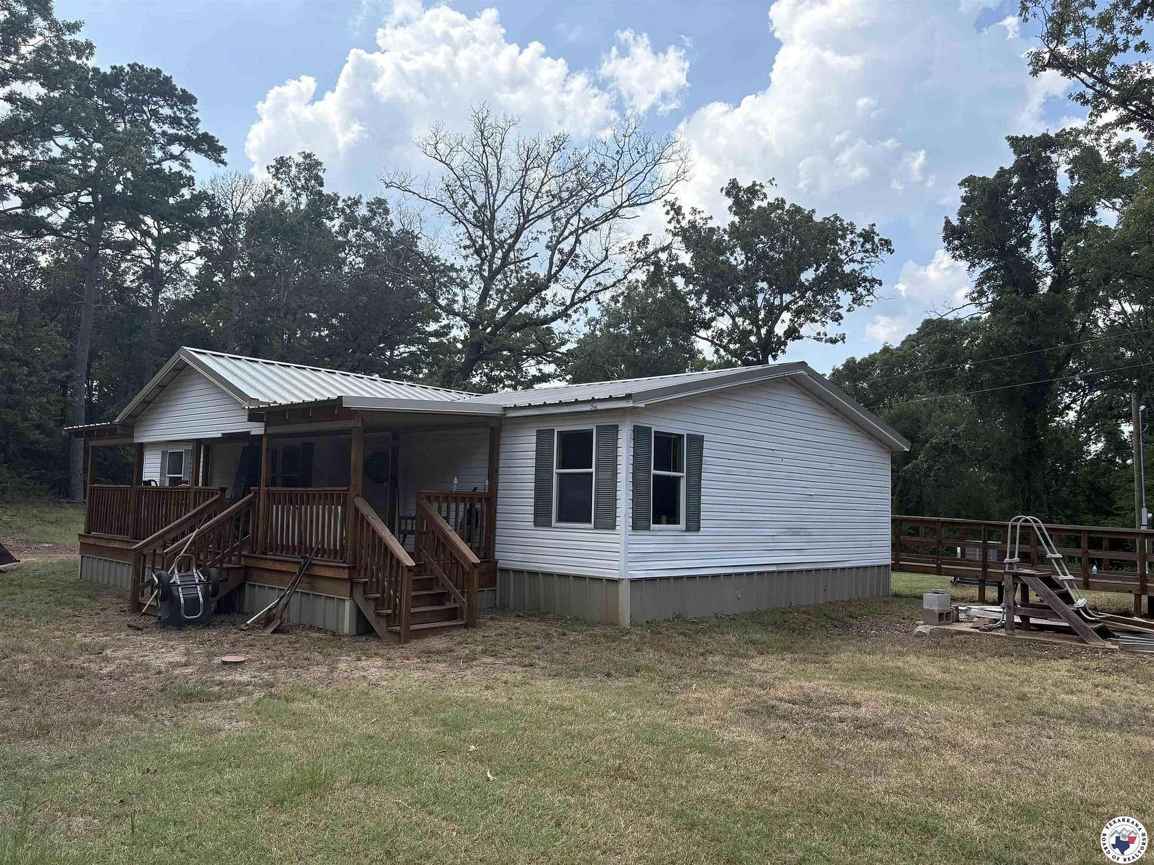 15.8 Acres of Recreational Land with Home for Sale in Lone Star, Texas