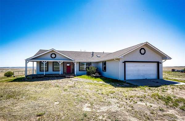 40.3 Acres of Agricultural Land with Home for Sale in Kiowa, Colorado