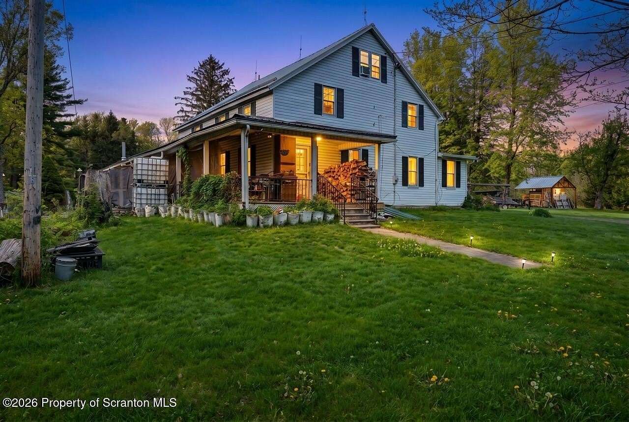 14.6 Acres of Improved Mixed-Use Land for Sale in Covington Township, Pennsylvania