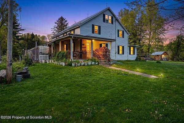 14.6 Acres of Improved Mixed-Use Land for Sale in Covington Township, Pennsylvania