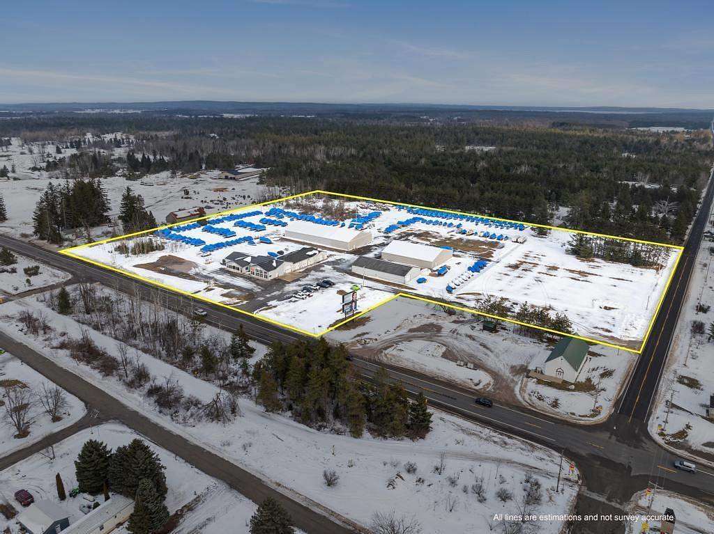 13.9 Acres of Improved Commercial Land for Sale in Brutus, Michigan