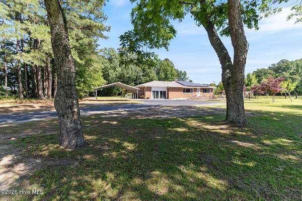 11.3 Acres of Land with Home for Sale in Raeford, North Carolina
