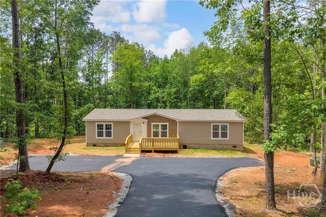 2.3 Acres of Land with Home for Sale in Colbert, Georgia