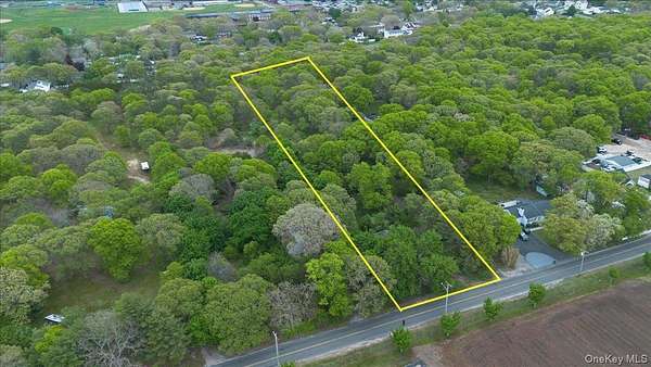 2.5 Acres of Land with Home for Sale in Centereach, New York