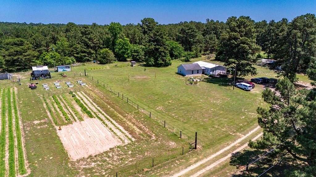 10.9 Acres of Land with Home for Sale in Nacogdoches, Texas