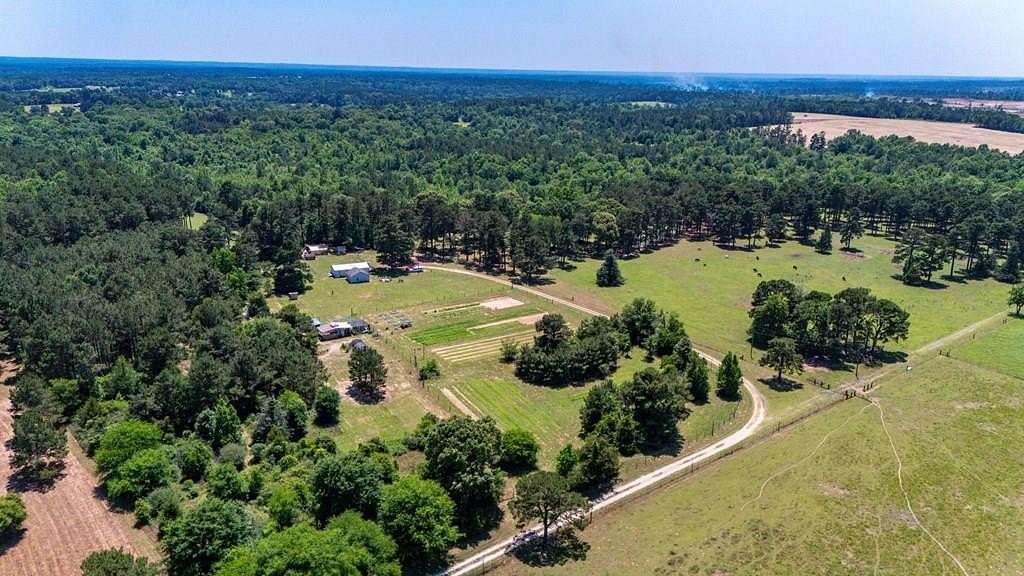10.9 Acres of Land with Home for Sale in Nacogdoches, Texas