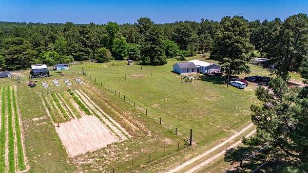 10.9 Acres of Land with Home for Sale in Nacogdoches, Texas