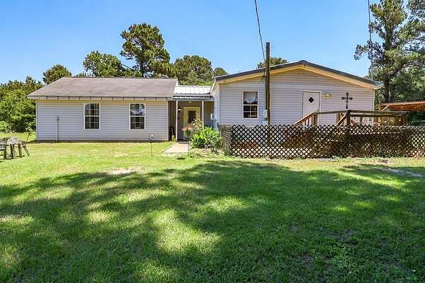 10.9 Acres of Land with Home for Sale in Nacogdoches, Texas