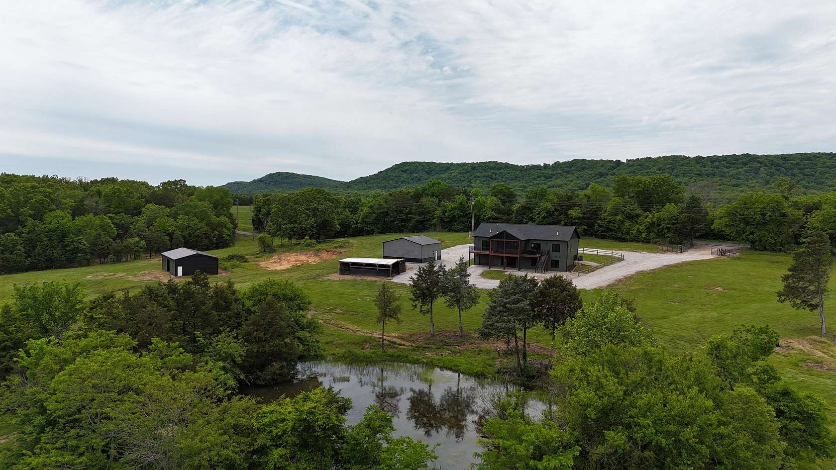 11.8 Acres of Land with Home for Sale in Shell Knob, Missouri