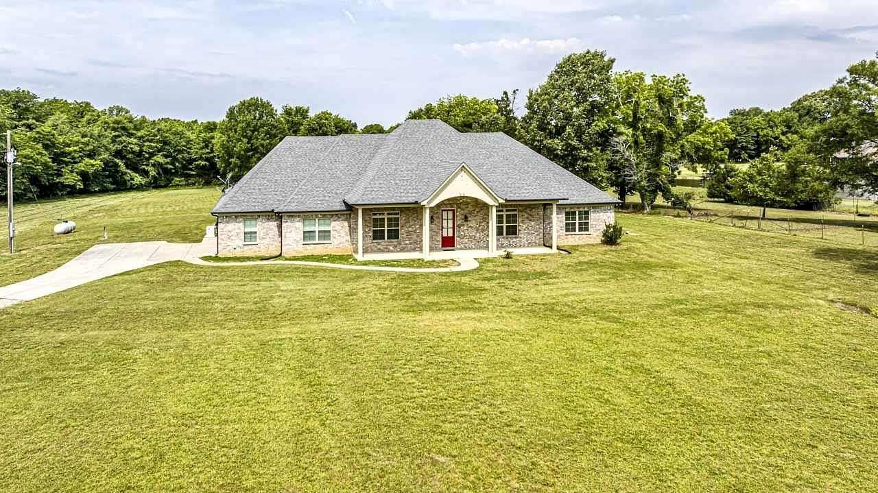 4.38 Acres of Land with Home for Sale in Mason, Tennessee