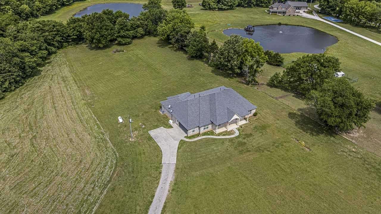 4.38 Acres of Land with Home for Sale in Mason, Tennessee