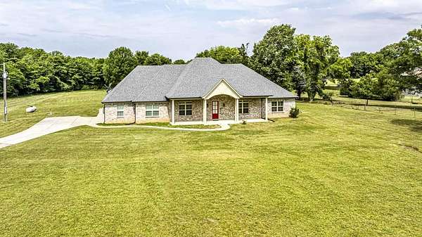4.38 Acres of Land with Home for Sale in Mason, Tennessee