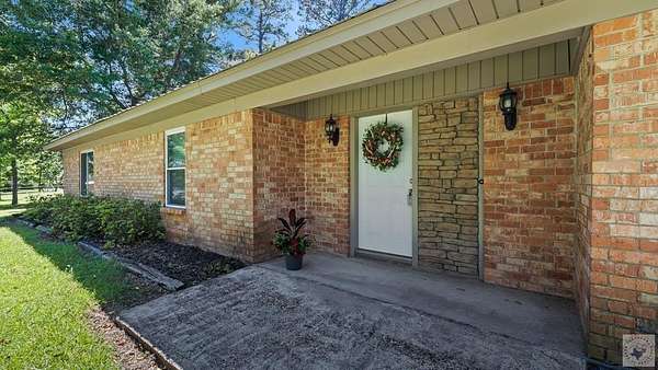 8.87 Acres of Land with Home for Sale in Bloomburg, Texas