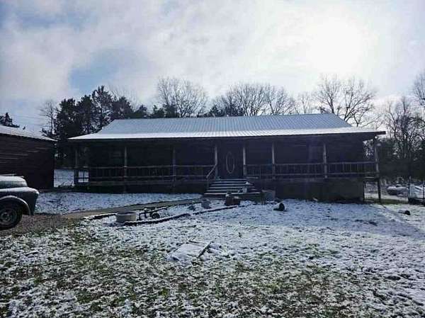 7 Acres of Land with Home for Auction in Warsaw, Missouri