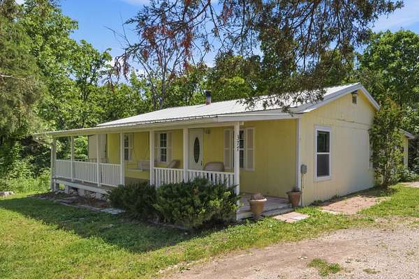 5 Acres of Land with Home for Sale in Gainesville, Missouri