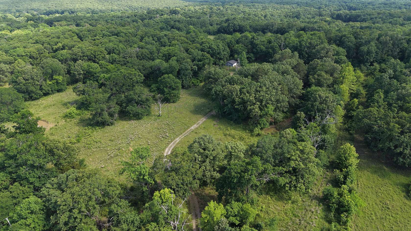 40 Acres of Land with Home for Sale in Wilburton, Oklahoma